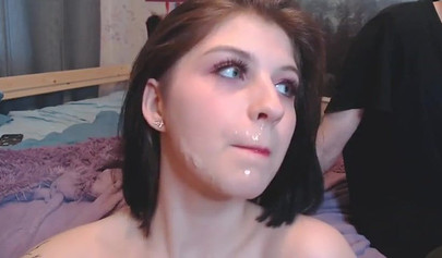 Petite Russian brunette deepthroating a big cock on webcam