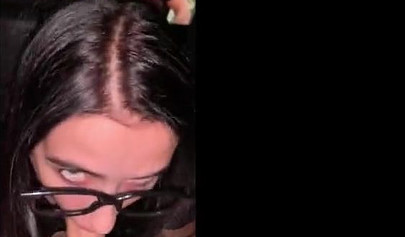 Lusty amateur teenie with sex glasses gives a blowjob at the cinema