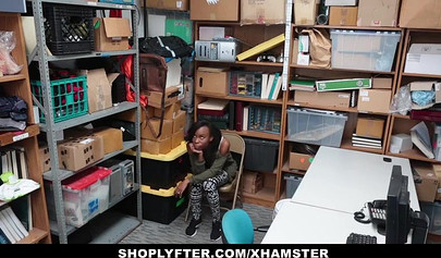 Skinny ebony teen gets fucked after a horny guard catches her shoplifting