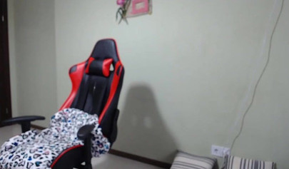 Horny nubile with a bubble butt jerks off on her gaming chair