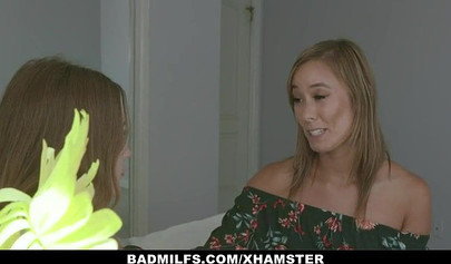 Two nubile babes share a penis together and service it by fucking