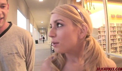 Cute young hottie slobbers on a massive rod before riding it