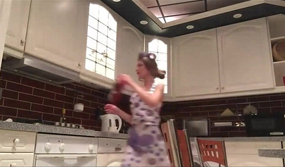 Tantalizing teen undresses in the kitchen and toys her ass hole