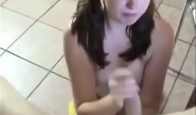 Chubby teenage chick with pigtails gets down on her knees to suck
