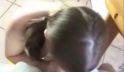 Chubby teenage chick with pigtails gets down on her knees to suck