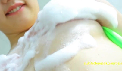 Japanese sensual teen showers her adorable bubbly and sweet butt with soap