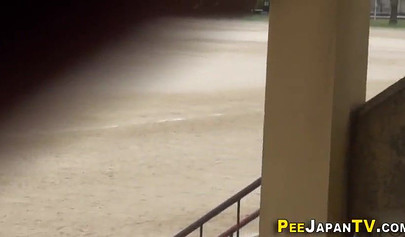 Japanese teen babe pisses in public and feels that adrenaline rushing thrill
