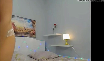 Blonde nubile reveals her body to her fans on a web camera