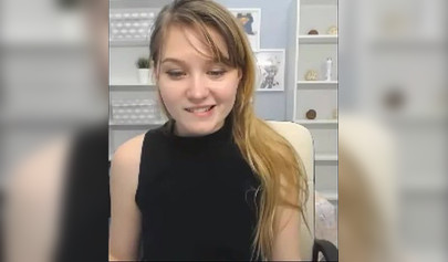 Blonde nubile reveals her body to her fans on a web camera