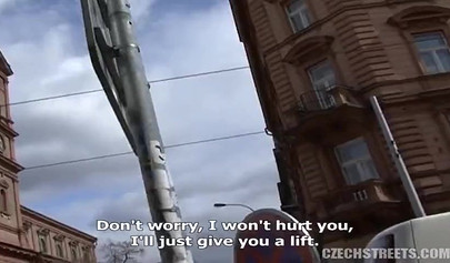 Sleazy teen with dark hair sucks a filthy cock in a car