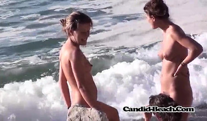 The beach is full of voluptuous naked bitches who want to fuck