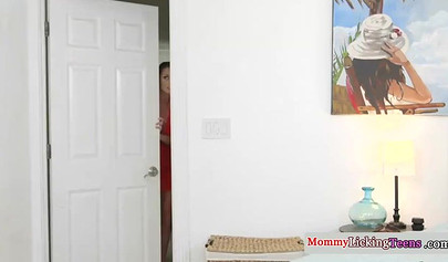 Delectable MILF satisfies her stepdaughter by playing with her pussy