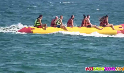 Cute babe with big boobs enjoys a day on a beach