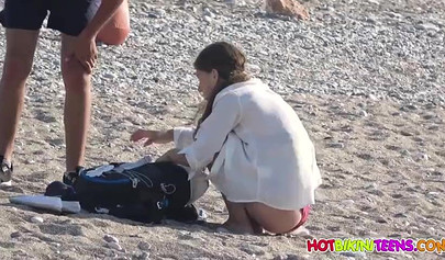 Cute babe with big boobs enjoys a day on a beach