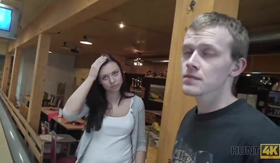 Slut with big boobs sucks her boyfriend's cock in a bowling alley