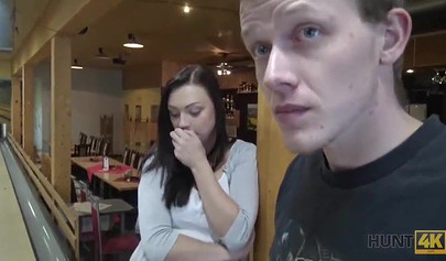 Slut with big boobs sucks her boyfriend's cock in a bowling alley