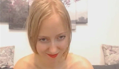 Naked tantalizing babe toys both of her holes on a webcam