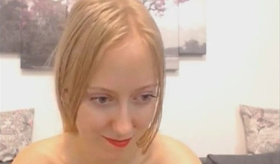 Naked tantalizing babe toys both of her holes on a webcam