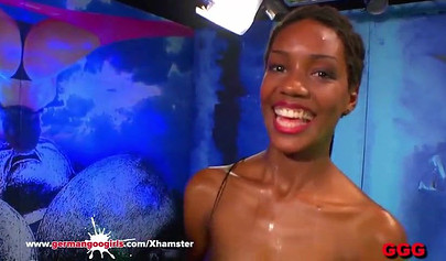 Ebony nubile is drilled doggy style in a gangbang before cum loads