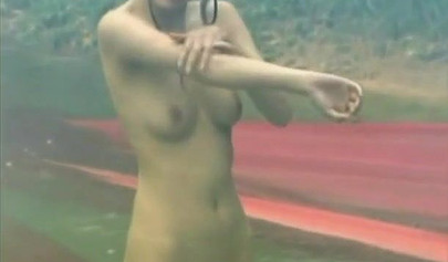 Stunning Chinese babe strips down to reveal her unshaven pussy