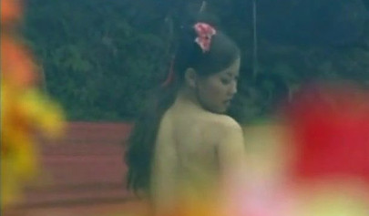 Stunning Chinese babe strips down to reveal her unshaven pussy