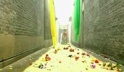 Stunning Chinese babe strips down to reveal her unshaven pussy