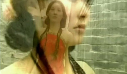 Stunning Chinese babe strips down to reveal her unshaven pussy