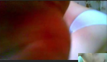 Amateur teen is stripping in her cam sex show and masturbates