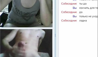 Amateur teen is stripping in her cam sex show and masturbates