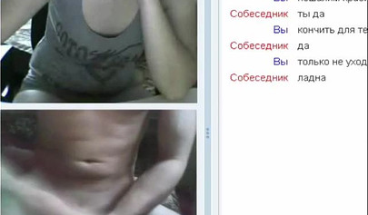 Amateur teen is stripping in her cam sex show and masturbates