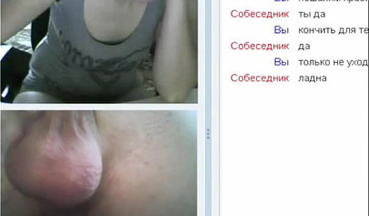 Amateur teen is stripping in her cam sex show and masturbates