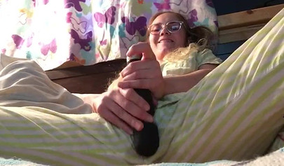 Innocent nubile uses vibrator through pajamas before stripping naked to cum hard