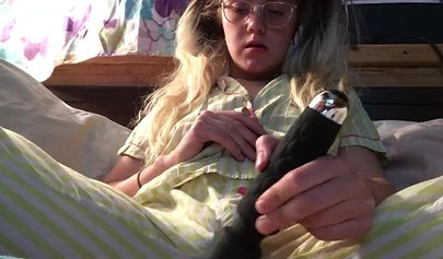 Innocent nubile uses vibrator through pajamas before stripping naked to cum hard