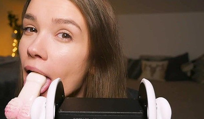 Playful teenie slobbers on her sex toys in an erotic ASMR video