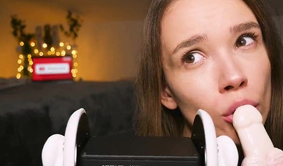 Playful teenie slobbers on her sex toys in an erotic ASMR video