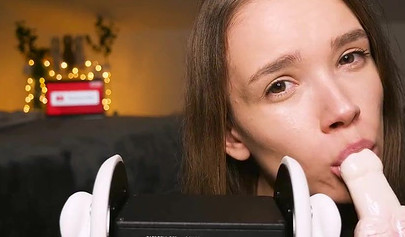 Playful teenie slobbers on her sex toys in an erotic ASMR video