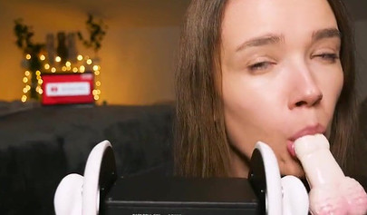Playful teenie slobbers on her sex toys in an erotic ASMR video