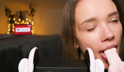 Playful teenie slobbers on her sex toys in an erotic ASMR video