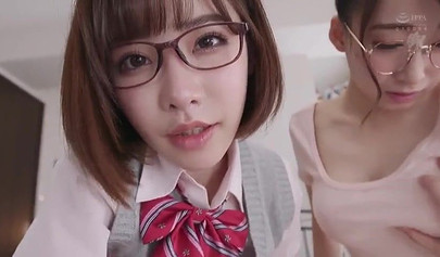 Young Japanese cuties give a sloppy blowjob before riding in a threesome