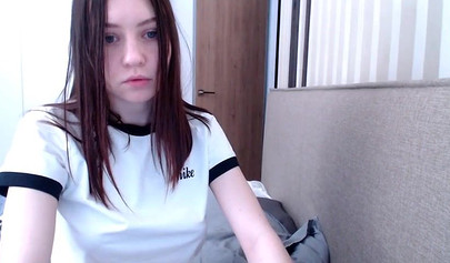 Gorgeous teen in a playful skirt uses dildo to fuck her pussy