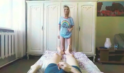 American blonde gives a handjob to her lucky roommate