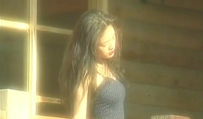 Beautiful and petite Chinese brunette teen stripping in public