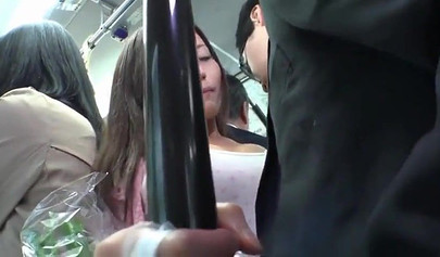 Big boobed Japanese lady gets kissed and fucked by a businessman on the bus