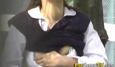 Sexy Asian teen caught in public masturbating and cumming hard