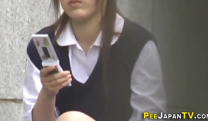 Sexy Asian teen caught in public masturbating and cumming hard