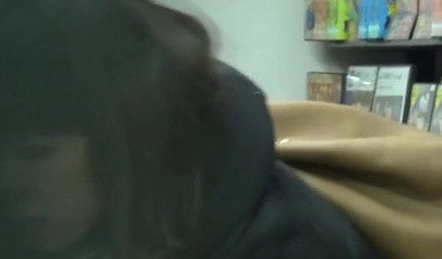 Horny Japanese teen rubbing her innocent vagina in the public toilet