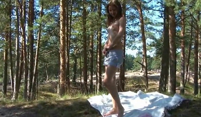 Pretty teen Lil Tammy stripping in nature and touching herself