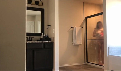 Hot 22 year old brunette Jessica gets spied on in the bathroom