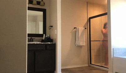 Hot 22 year old brunette Jessica gets spied on in the bathroom