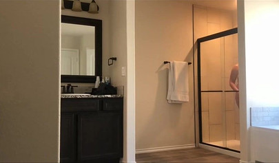 Hot 22 year old brunette Jessica gets spied on in the bathroom